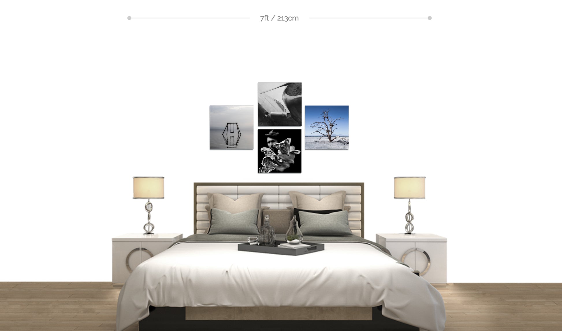 Set of four metal square prints Random Acts Series displayed in cross formation on wall above bed