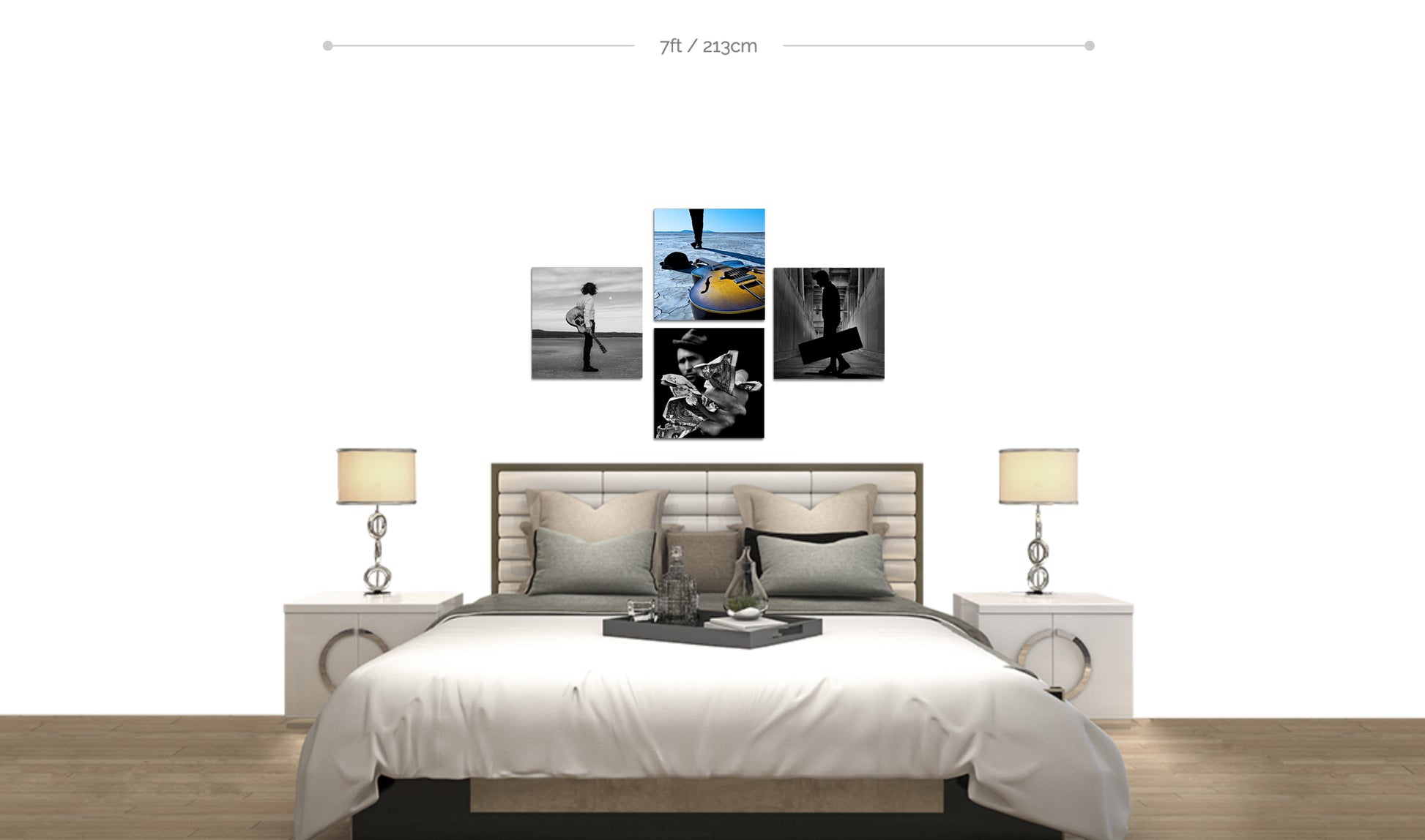 Set of four fine art square metal prints in black and white and color arranged in cross formation on wall above bed in bedroom