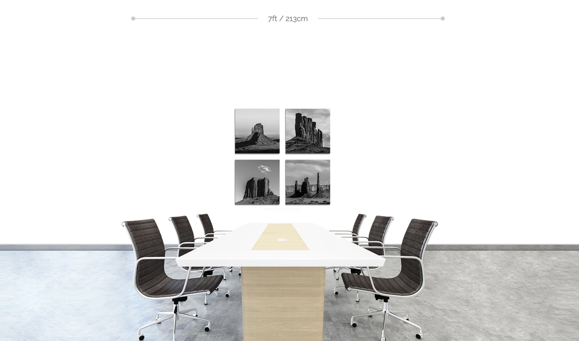 Monument Valley Square Metal Prints set of 4 displayed arranged in square formation on wall behind boardroom table with chairs