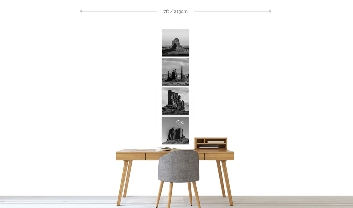 Monument Valley Metal Prints set of four displayed in vertical line above home office desk with chair