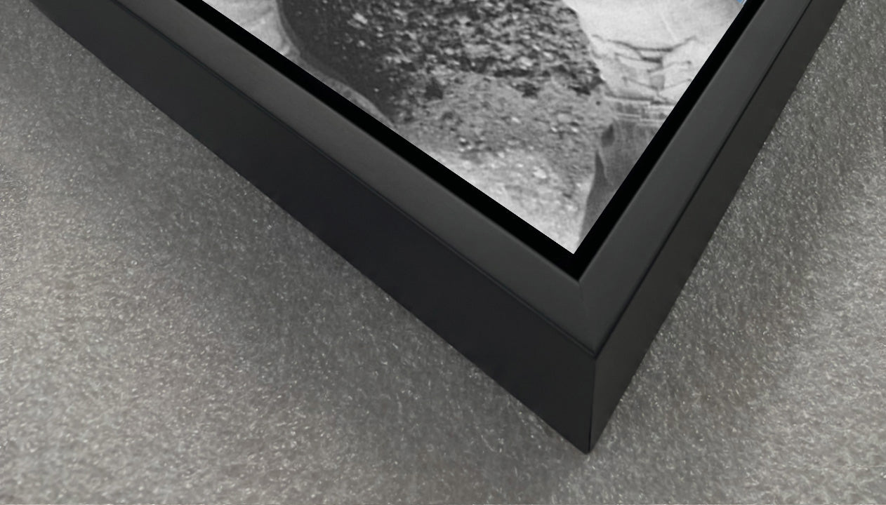 Closeup example black float frame corner edge