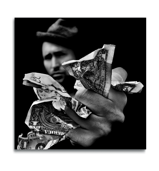 Fine Art Black and White square metal print man wearing hat out of focus in background holding money in his fist outstretched to camera in foreground