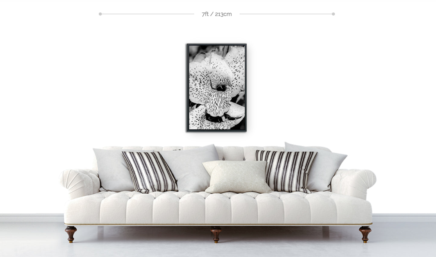 Flower wall decor example 30x20 framed flower print black and white closeup of spotted lily hanging above sofa